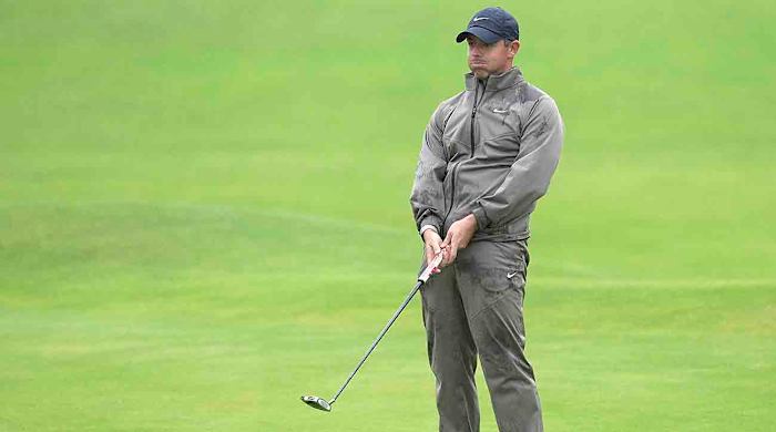 Rory McIlroy reacts after putting on the 18th green during the final day of the 2023 British Open.